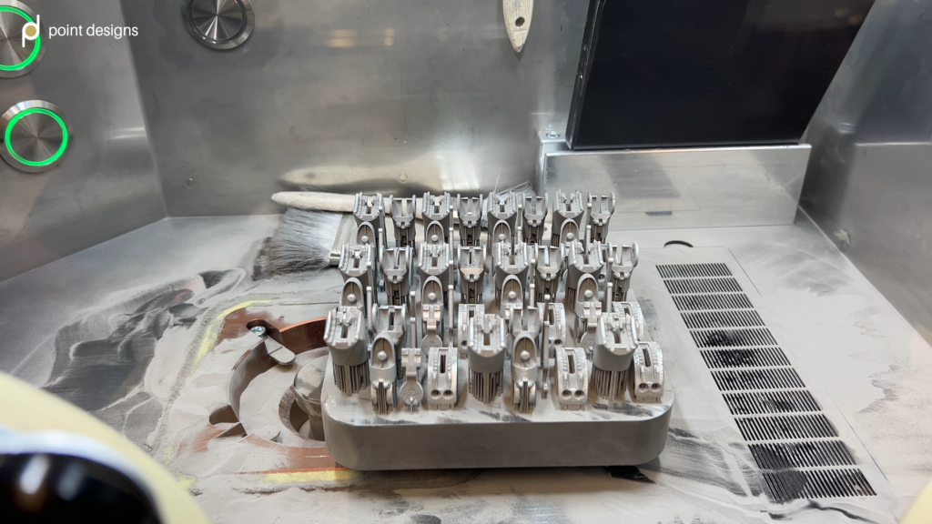 How Point Designs Uses In-House Metal 3D Printing for Serial Production of Titanium Prosthetic Fingers point designs